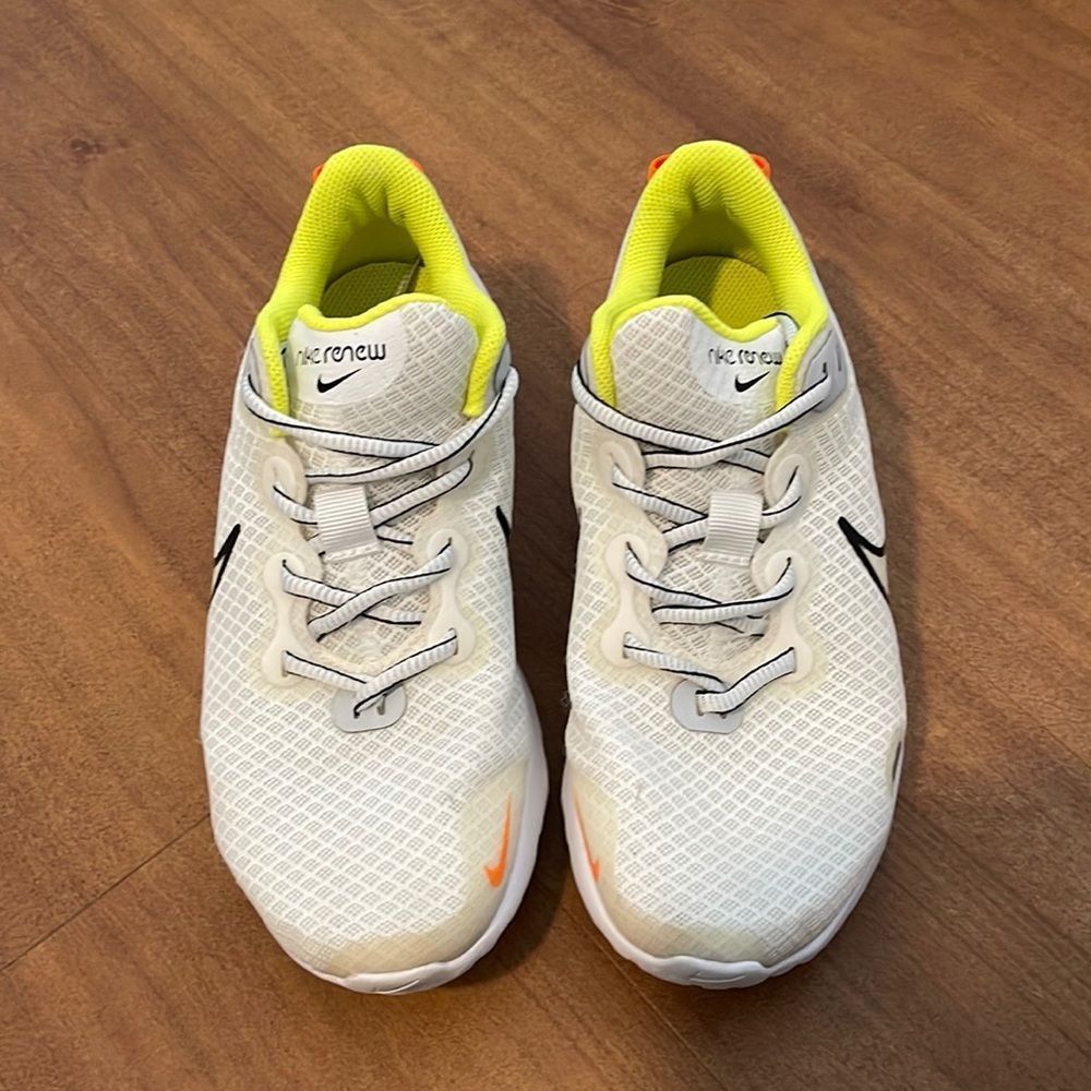Nike renew sneakers. White with neon colors, size 7. Good condition